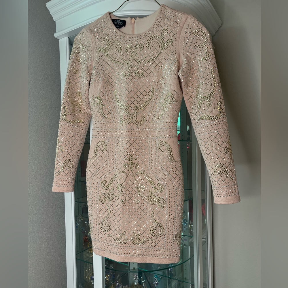 Like new’ Bebe long sleeve mini dress